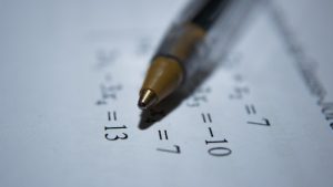 A compass and ruler, the classic tools of geometric construction