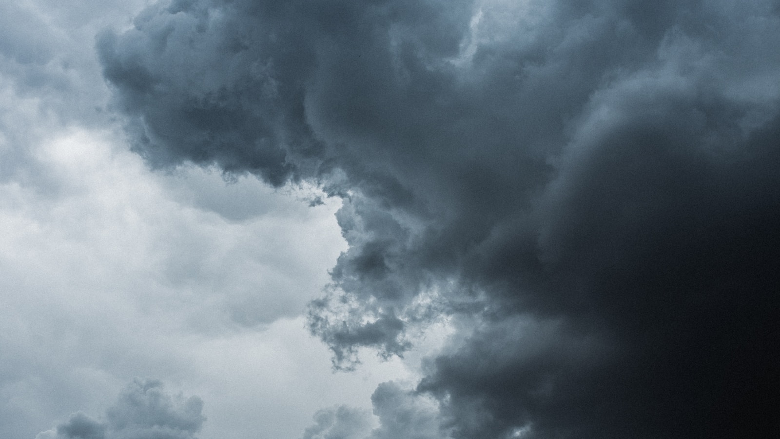 Cloudy skies representing the uncertainty of weather forecasting